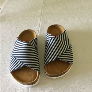 Magnified slides sandals.